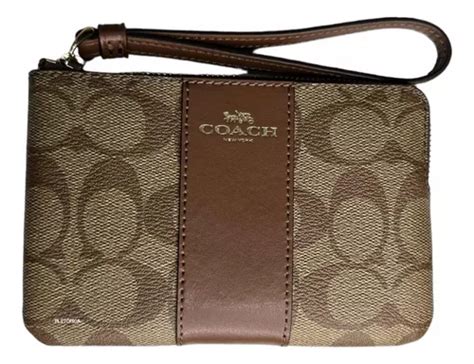 muñequeras coach precio